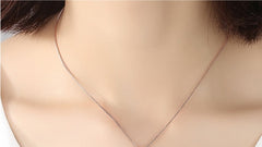 Caja Rosa Metálica para Joyería con Diseño Elegante